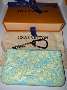 Authentic Louis Vuitton Empreinte Monogram Summer Stardust Monogram Key Pouch